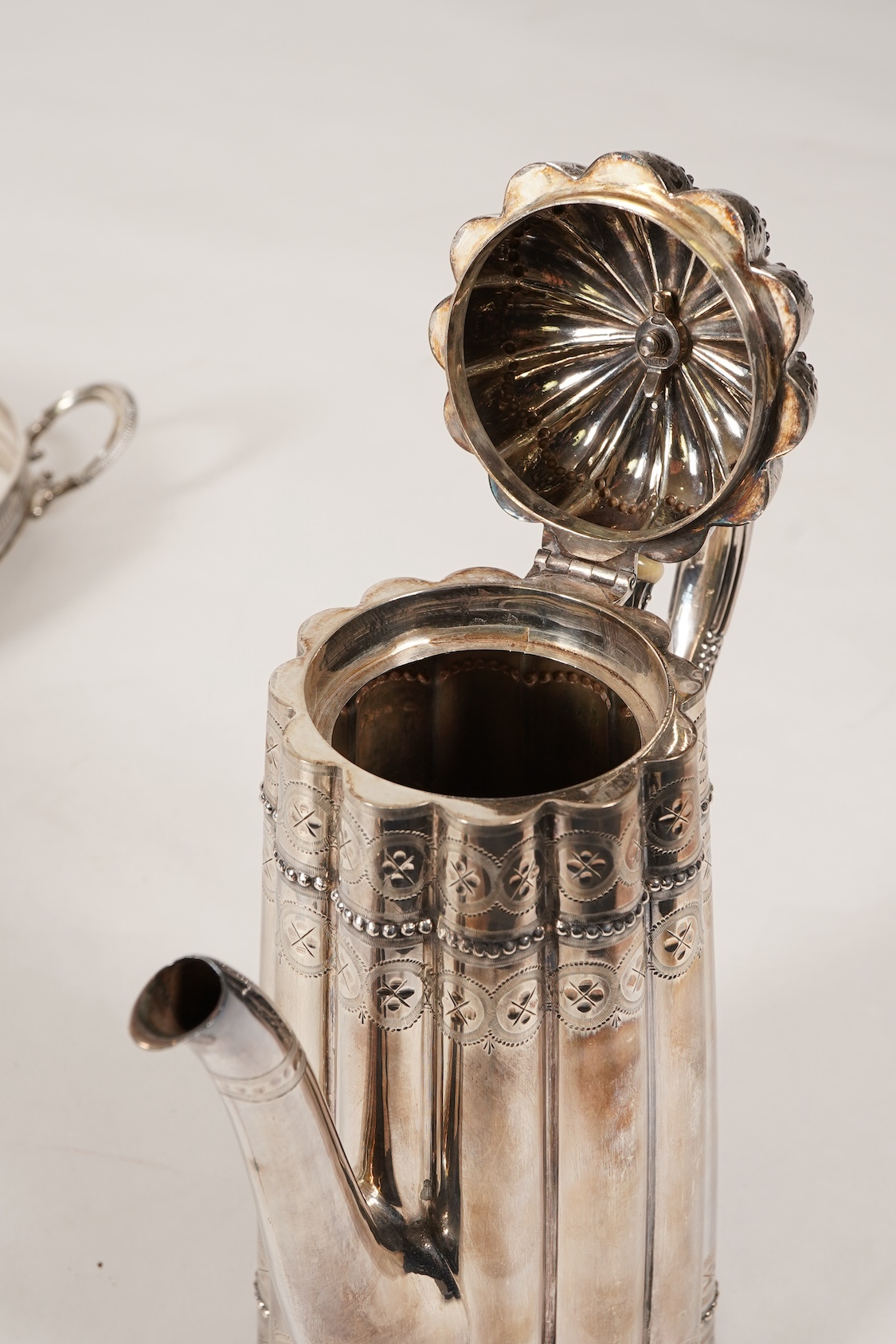 A late Victorian five piece silver tea and coffee service, all pieces with makers marks for John Edward Bingham and Walker & Hall